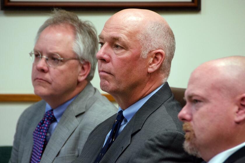 Congressman-elect Greg Gianforte, center, sits alongside William Mercer, left, and Todd Whipple Monday, June 12, 2017, during his court hearing in Bozeman, Mont. Gianforte plead guilty to assaulting Ben Jacobs, a Guardian reporter, on the eve of the special election in Montana. (Freddy Monares/Bozeman Daily Chronicle via AP)