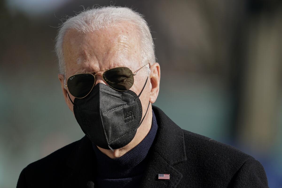 President Joe Biden walks on the South Lawn of the White House