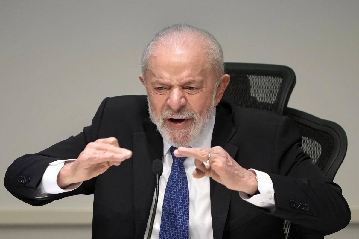 Luiz Inacio Lula da Silva gestures as he speaks