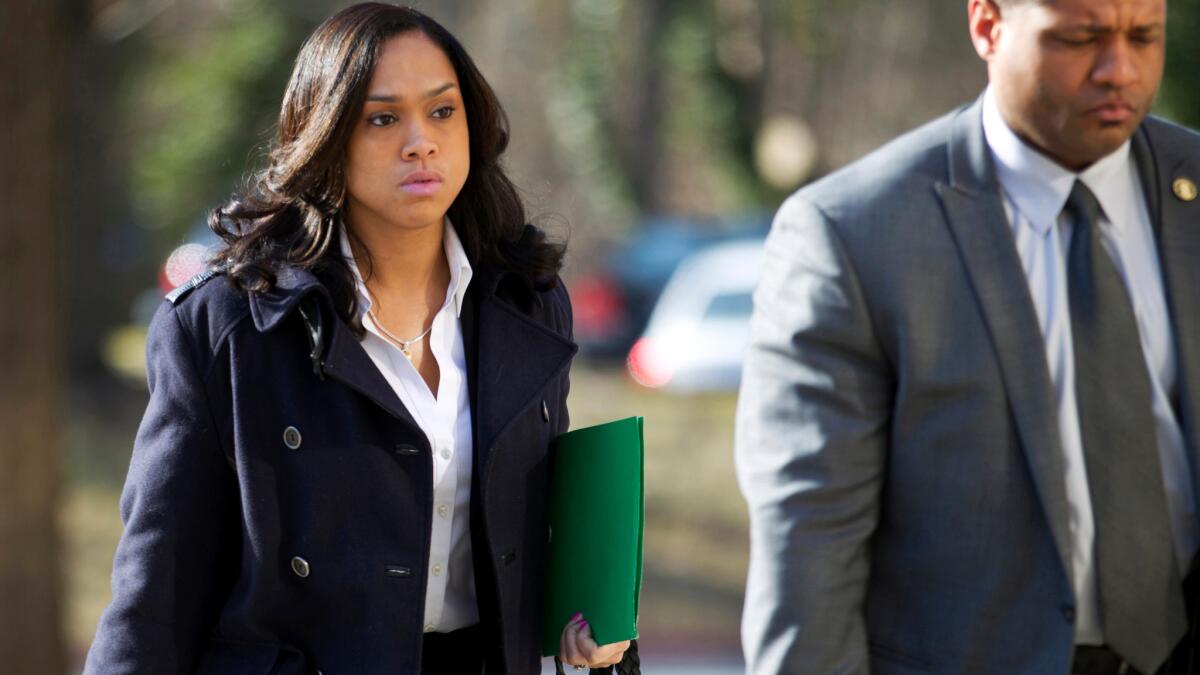 Baltimore State's Atty. Marilyn J. Mosby arrives a courthouse.