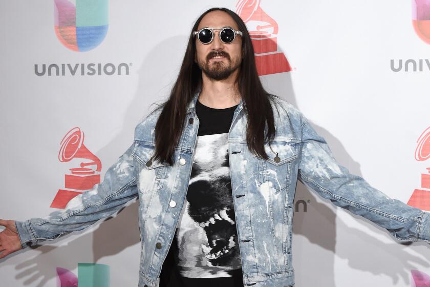 Grammy-nominated producer, DJ and fashion label owner Steve Aoki poses in the media room during the 18th annual Latin Grammy Awards in Las Vegas on Nov. 16, 2017.