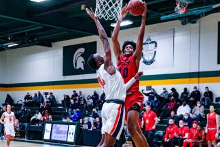 Jaden Henley of Colon (10) goes up for shot against Rolling Hills Prep's Kenny Manzi.