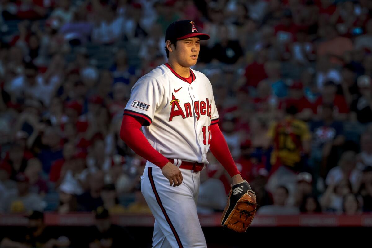 Angels star Shohei Ohtani walks off the mound during a game.