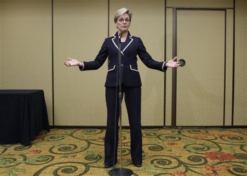 Michigan Gov. Jennifer Granholm answers questions during a news conference in Troy, Mich., Wednesday, Nov. 12, 2008. Granholm said that the crisis in the auto industry is urgent, arguing that "the national economy rests on this." (AP Photo/Paul Sancya)