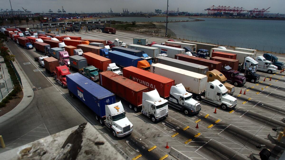 Truckers line up at the entrance of a cargo terminal in the Port of Long Beach.