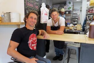 Brothers Josh George, 35, left, and Jeremy George, 32, co-own Smokin J's BBQ, which opened Nov. 29 near Old Poway Park.