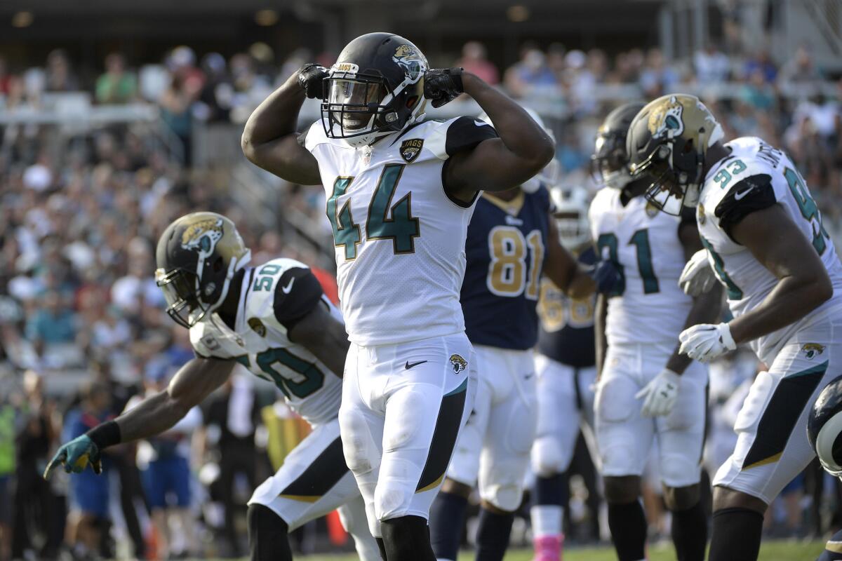 Jaguars linebacker Myles Jack celebrates after making a tackle against the Rams during a game earlier this season.
