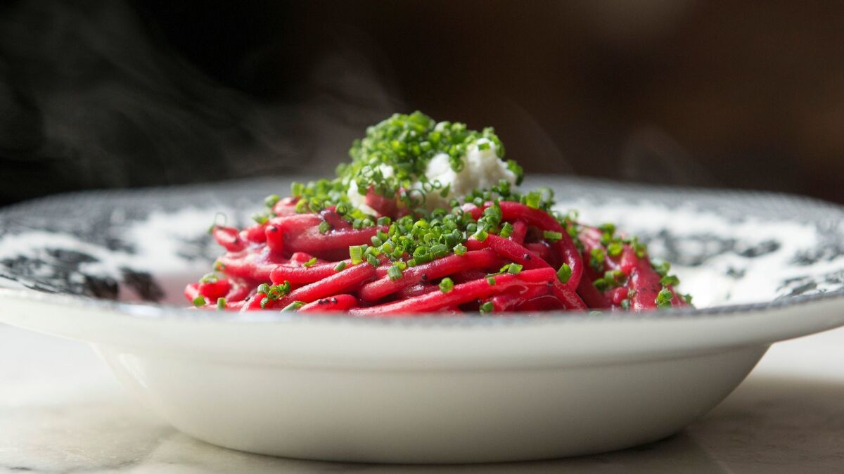 The beet pasta with goat cheese, poppyseed and chives at Cento. (Myung J. Chun / Los Angeles Times)
