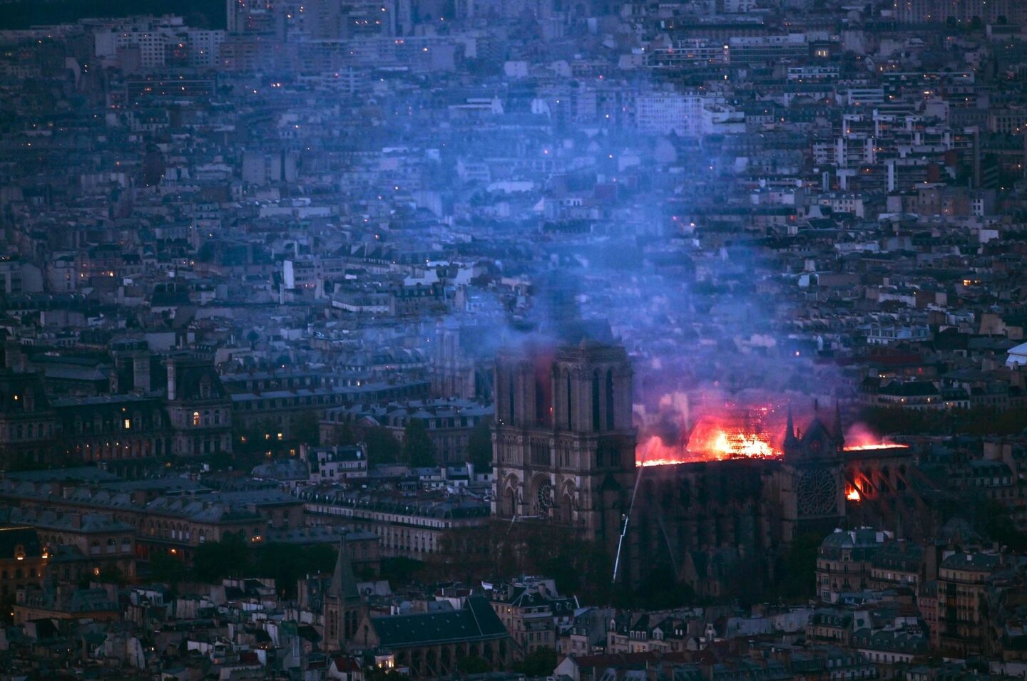The view from Montparnasse Tower shows flames and smoke at Notre Dame. A ferocious and fast-moving blaze, which broke out about 6:45 p.m., destroyed large parts of the 850-year-old Gothic monument in Paris.