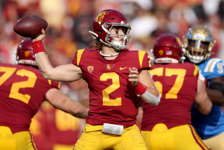 LOS ANGELES, CALIFORNIA - NOVEMBER 20: Jaxson Dart #2 of the USC Trojans passes during the second quarter.