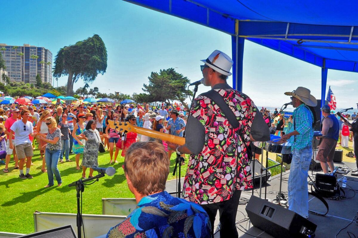 Crowds groove to cajun-blues tunes from Theo and The Zydeco Patrol during a previous La Jolla Concerts by the Sea event at Scripps Park in La Jolla Cove. The free music series will return in summer 2020 after a three-year absence.