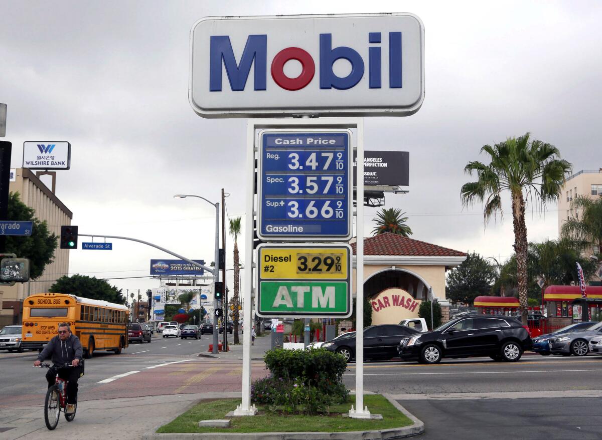 Sign at a gas station in Los Angeles in happier times, gas-price-wise.