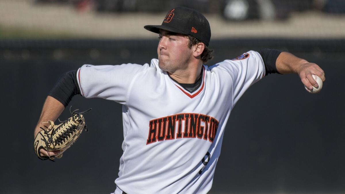 Josh Hahn, shown pitching on March 1, 2018, earned the save in Huntington Beach High's 4-2 win against Sherman Oaks Notre Dame at the Boras Classic South tournament on Wednesday.