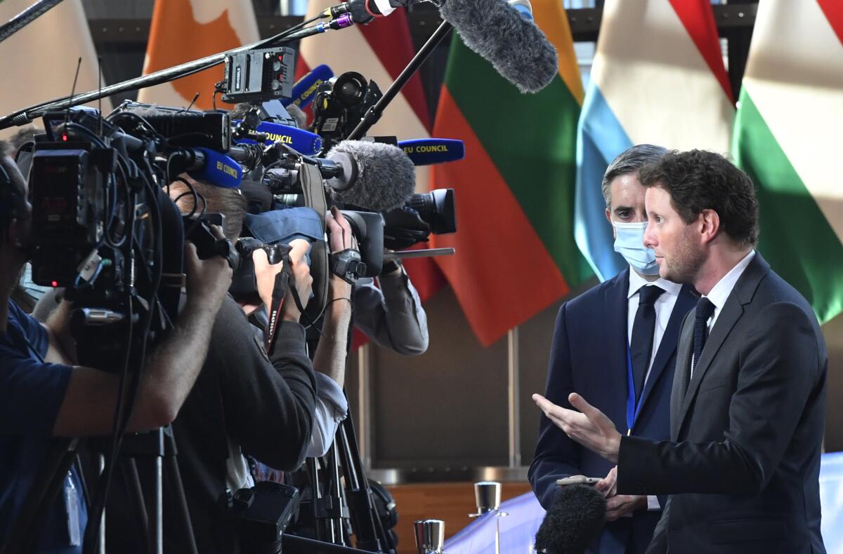 France's European Affairs Minister Clement Beaune speaks with the media.