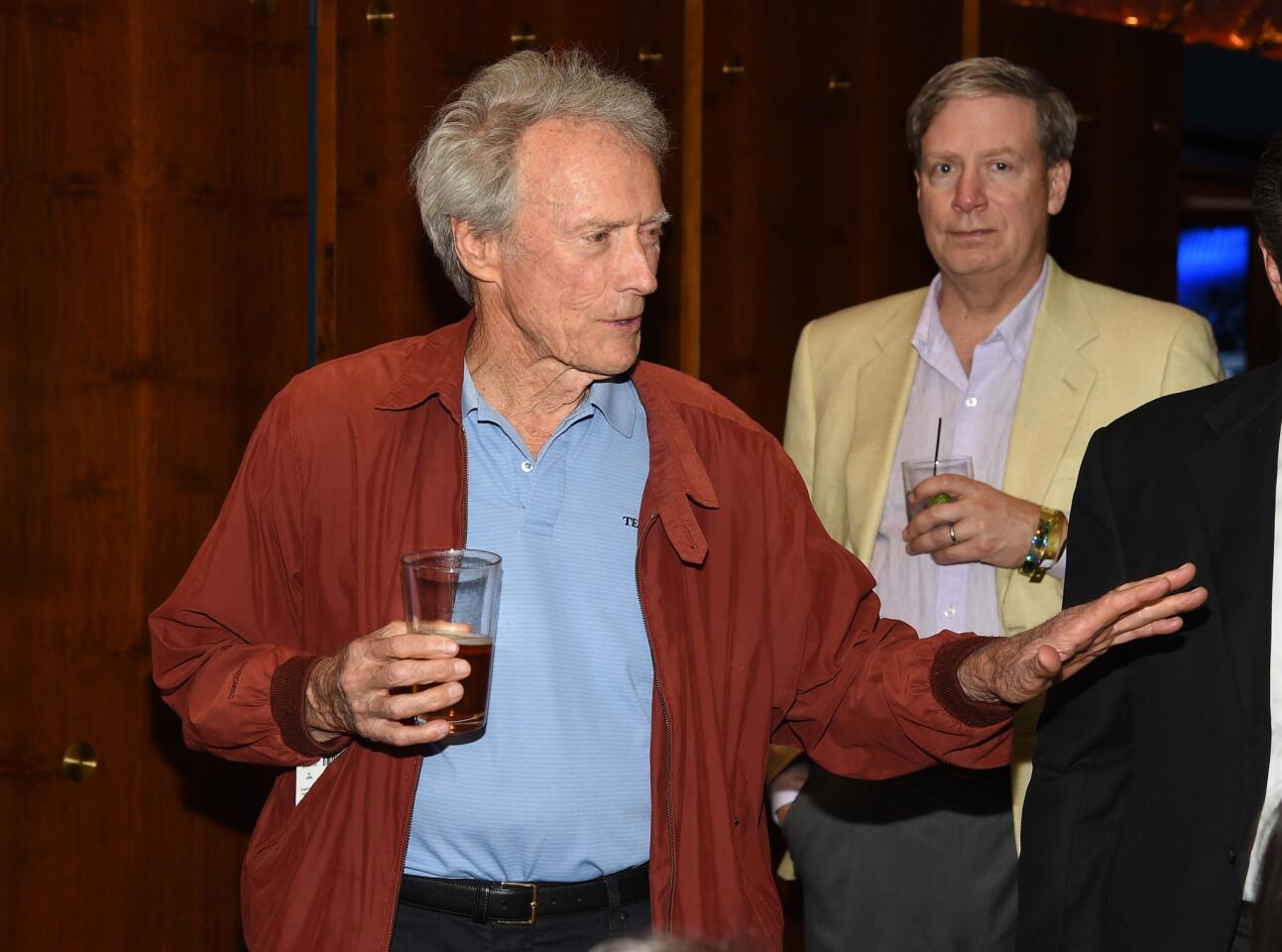 Actor and director Clint Eastwood, left, attends the Showtime VIP post-fight dinner at the MGM Grand Hotel & Casino in Las Vegas on Saturday night.
