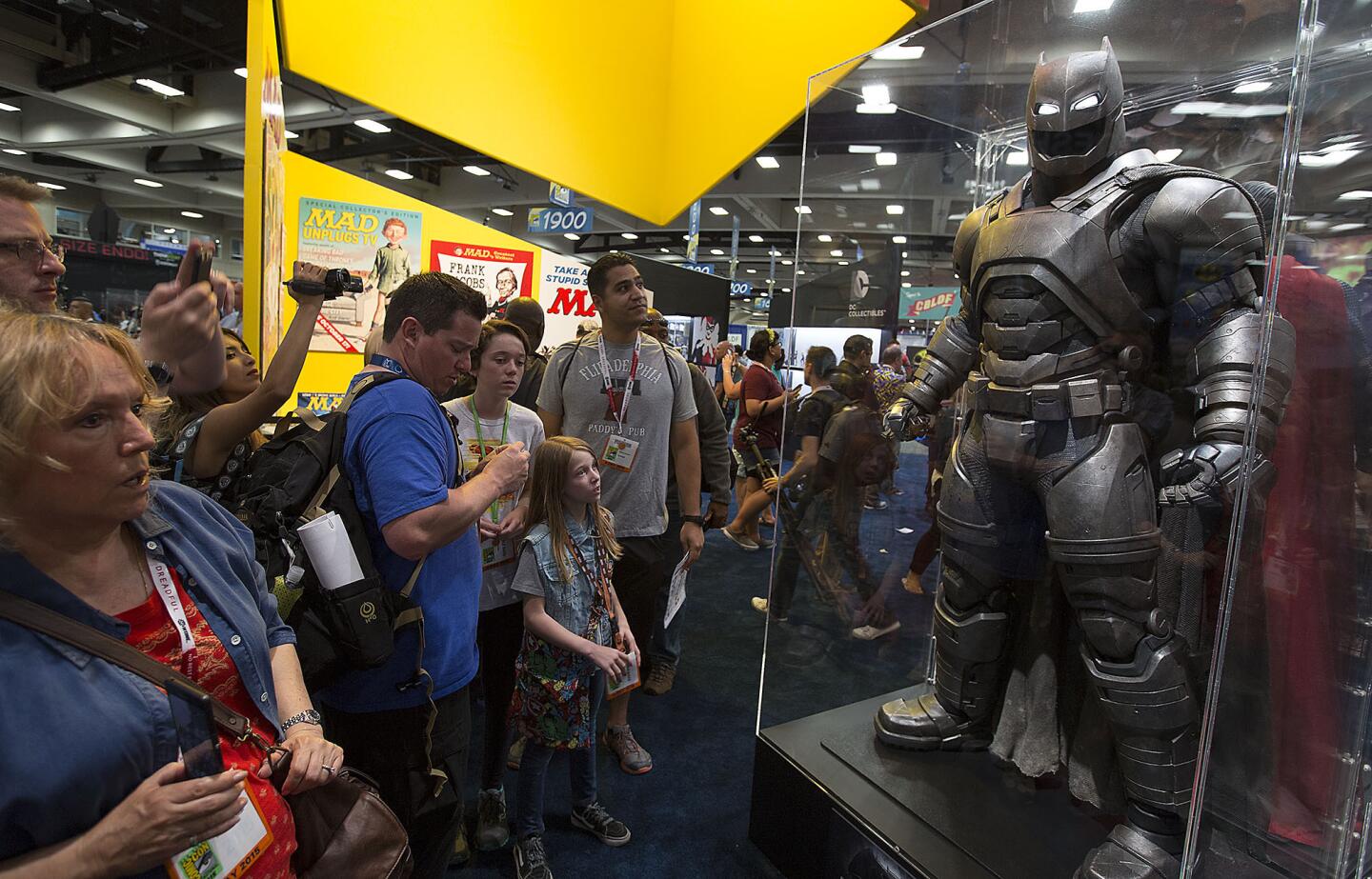 Fans check out new Batman costume July 8 at Comic-Con in San Diego.