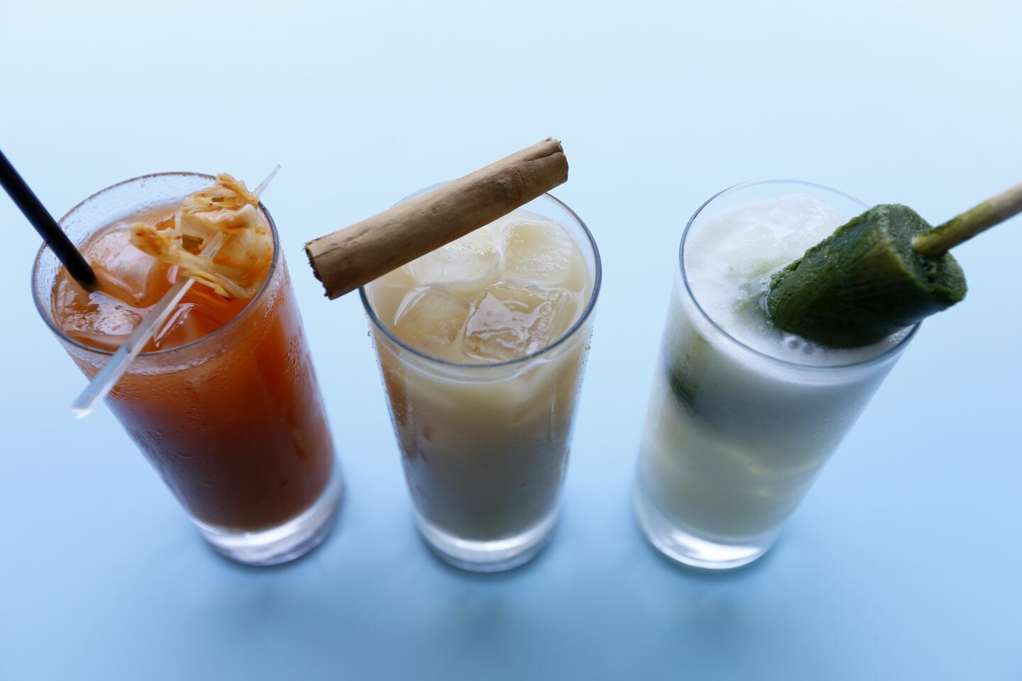 Kimchi Bloody Mary, left, horchata with rum & cold brew coffee with cinnamon, middle, Nasty Gal: Cachaca, cherimoya, coconut, nasturtium, right, at the Alma restaurant.