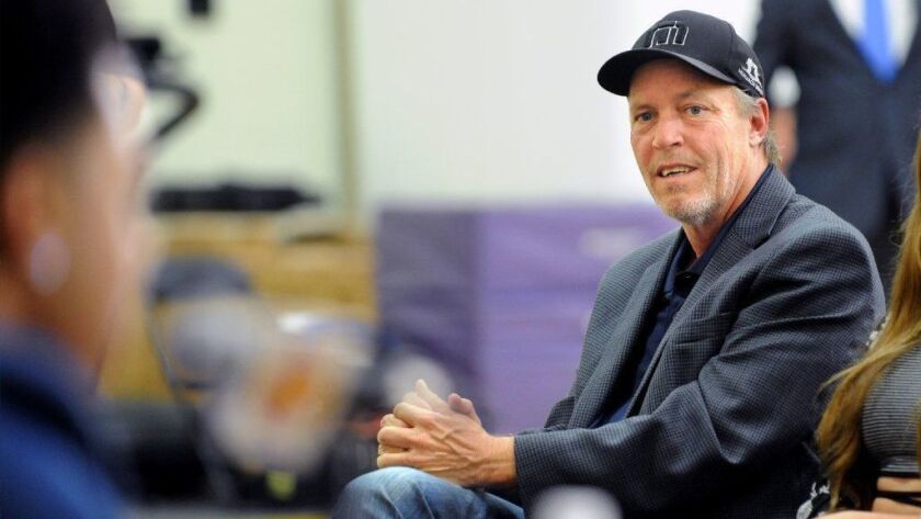 Lakers part-owner Jim Buss has relisted his penthouse in downtown Los Angeles for $6.75 million.
