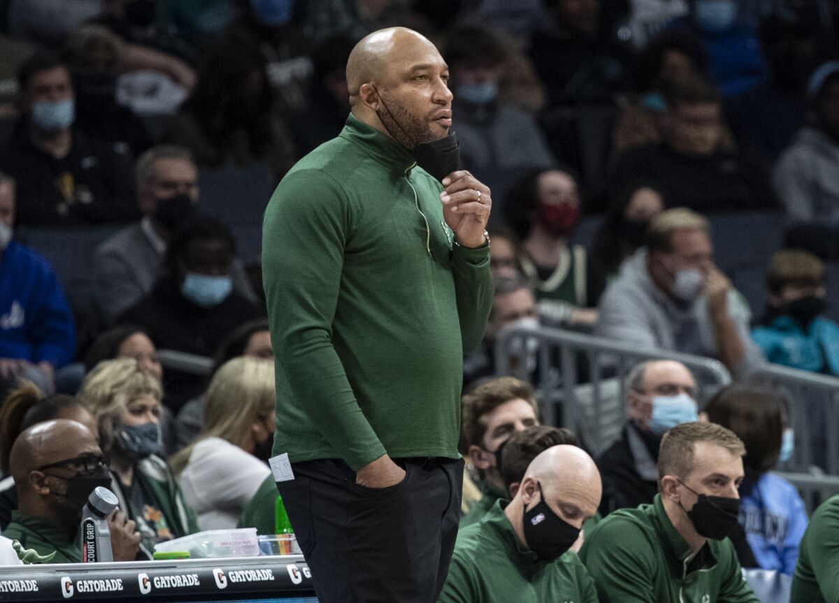 Milwaukee Bucks acting coach Darvin Ham watches during the first half of the team's game against the Charlotte Hornets.