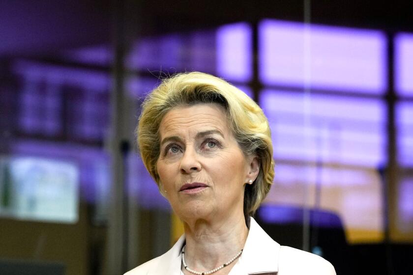 European Commission President Ursula von der Leyen waits for the start of the College of Commissioners meeting at EU headquarters in Brussels on Wednesday, July 20, 2022. European Union Commissioners started to put the finishing touches early Wednesday on a drastic plan to make sure that any Russian cut off of its vast natural gas supplies to the bloc will not disrupt industries and send an additional chill through homes next winter. (AP Photo/Virginia Mayo)