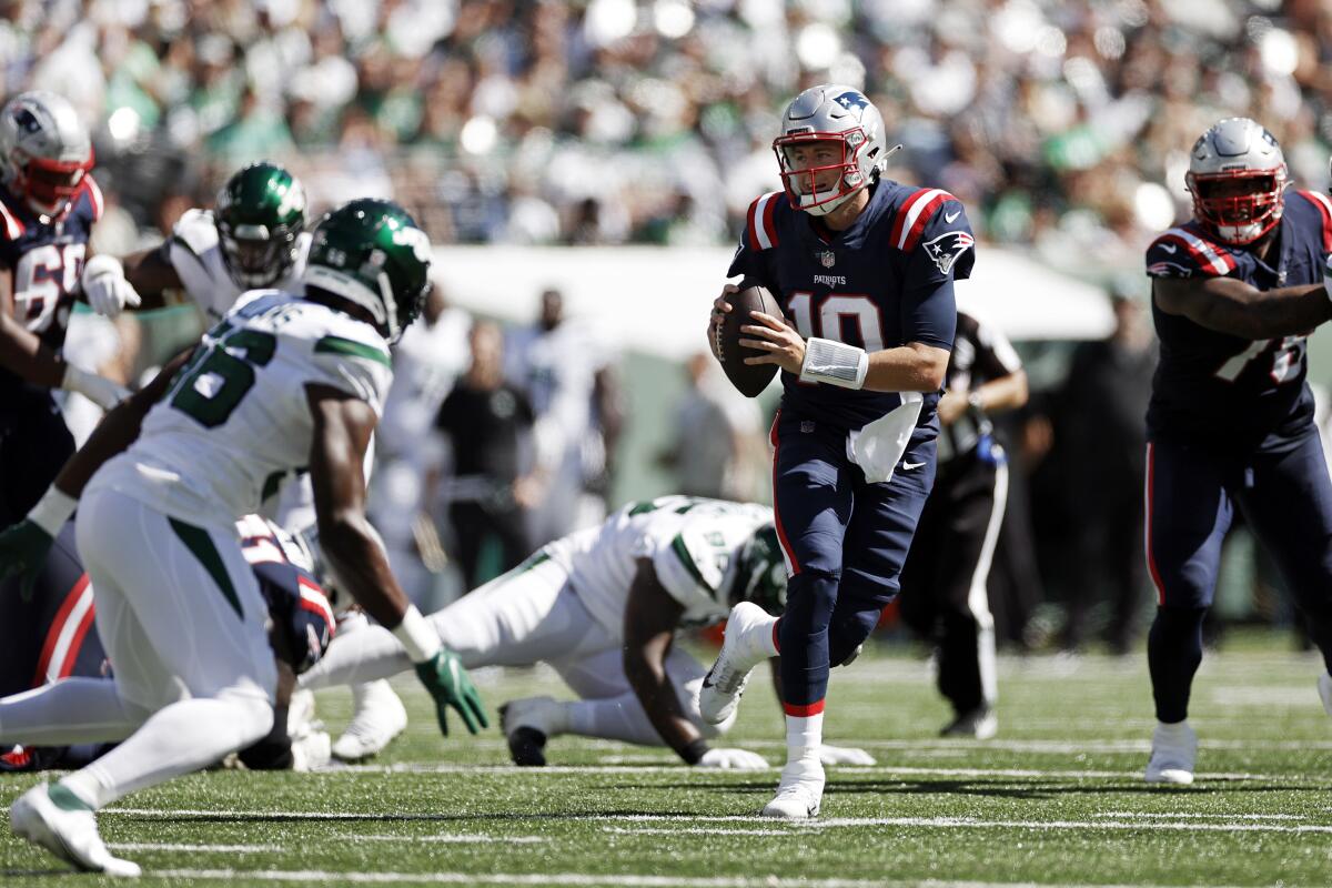 New England Patriots quarterback Mac Jones looks to pass against the New York Jets on Sunday.