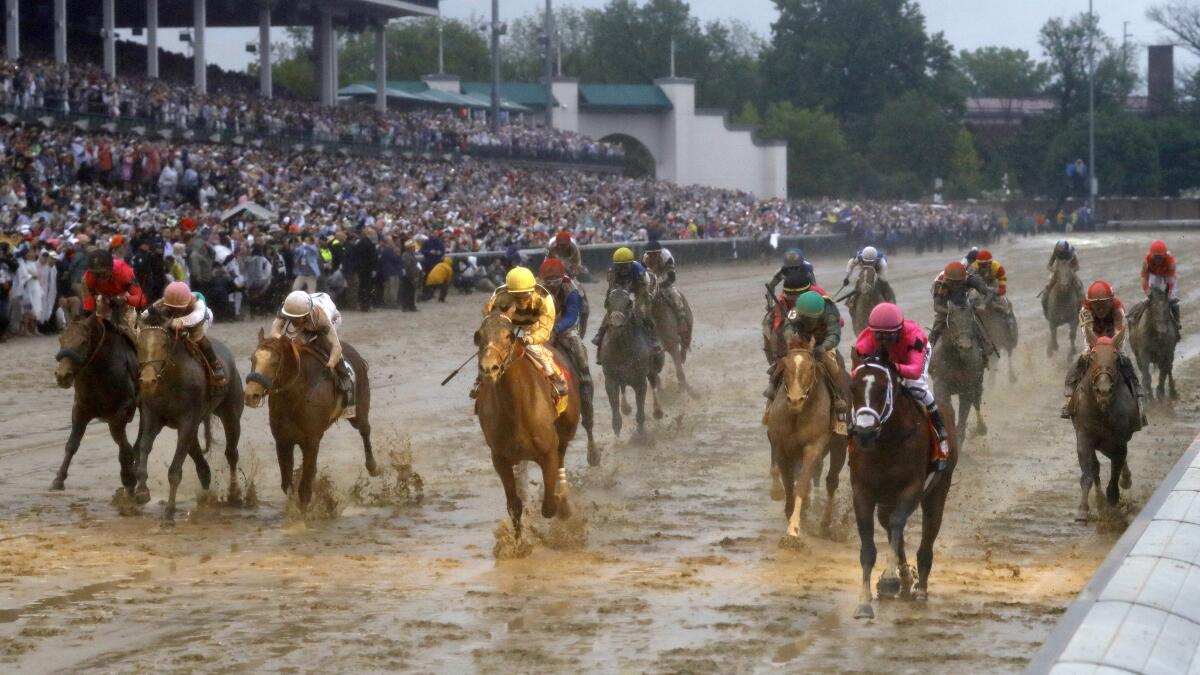 Luis Saez rides Maximum Security across the finish line during the 2019 Kentucky Derby horse race at Churchill Down.