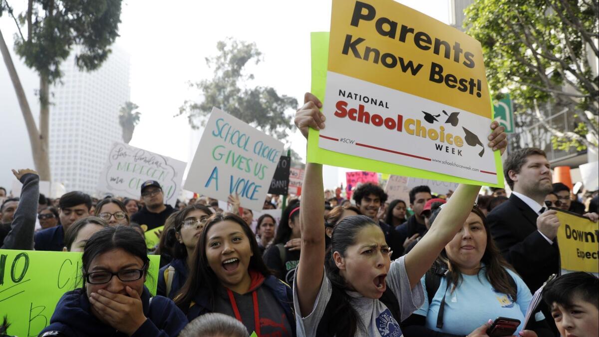 Demonstrators rally in support of charter schools at L.A. Unified headquarters, west of downtown, opposing a moratorium on new charters.