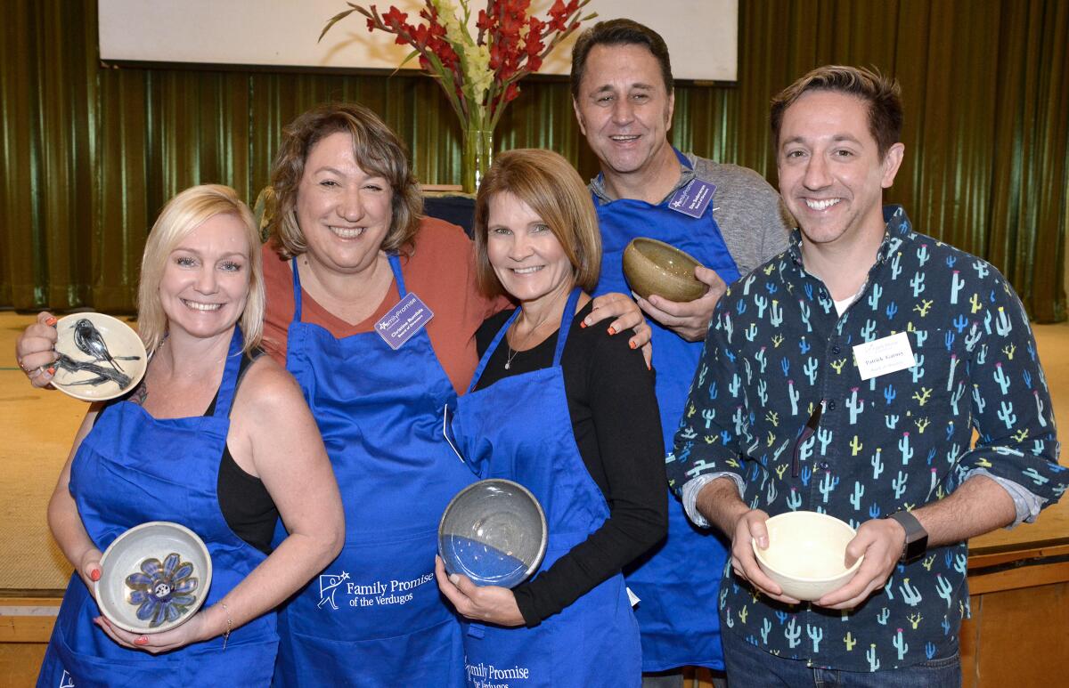 Dawn Greenwood, from left, Christine Rumfola, Jane Winter, Dan Soderstrom and Patrick Garney were among those who made the Empty Bowl event a success on Sunday.