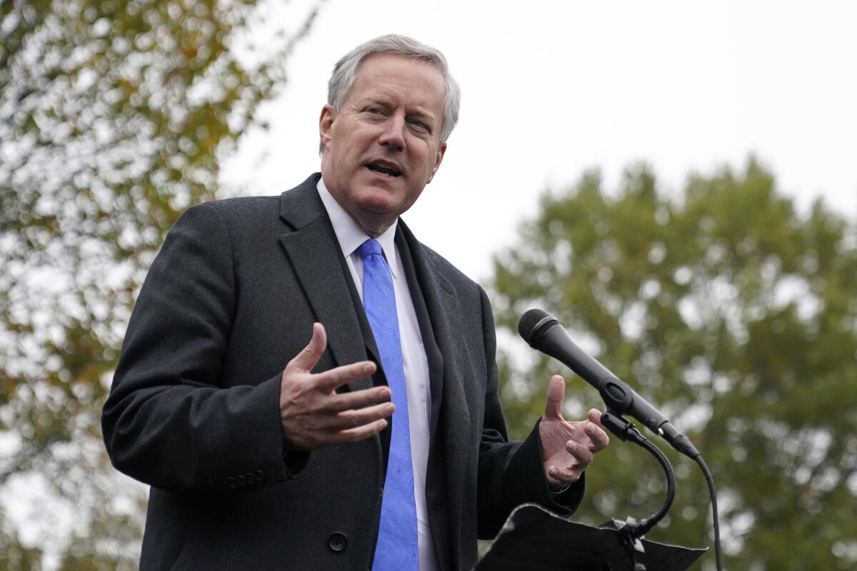 Mark Meadows speaks with reporters outside the White House in 2020.