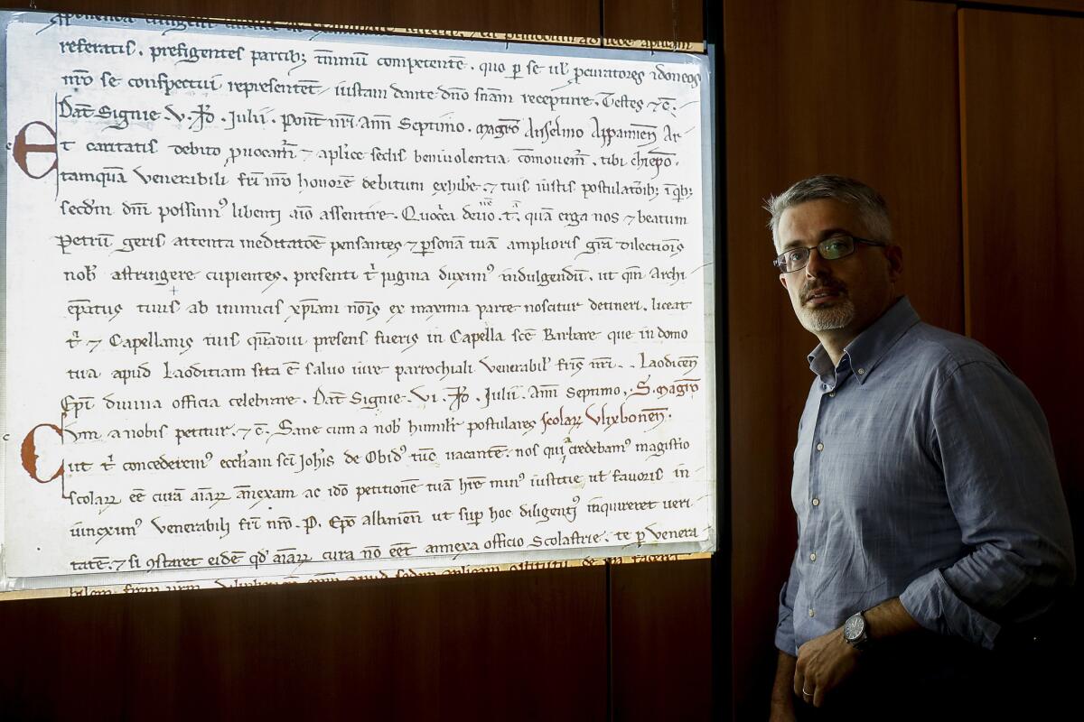 Marco Maiorino, archivist for the Vatican Secret Archives, is part of the team working on the software called In Codice Ratio, aimed at transcribing medieval Latin texts.
