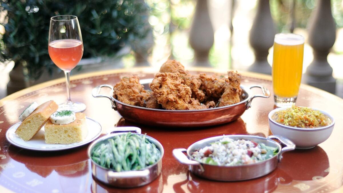 The fried chicken at Bouchon is served with weekly rotating sides. (Mariah Tauger / For The Times)