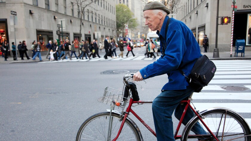 Photographer Bill Cunningham cycling to work in New York City in 2010.
