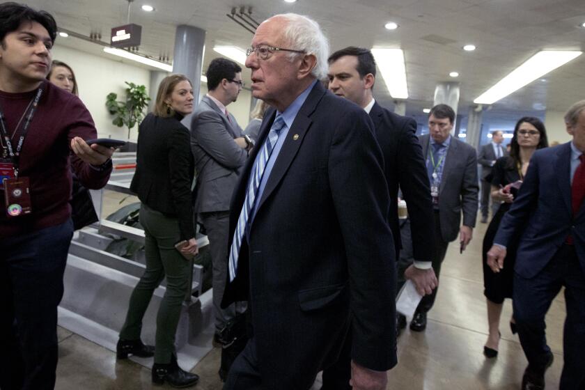 Sen. Bernie Sanders, I-Vt., walks to the Senate chamber for the impeachment trial of President Donald Trump on Capitol Hill in Washington, Wednesday, Jan. 22, 2020. (AP Photo/Jose Luis Magana)