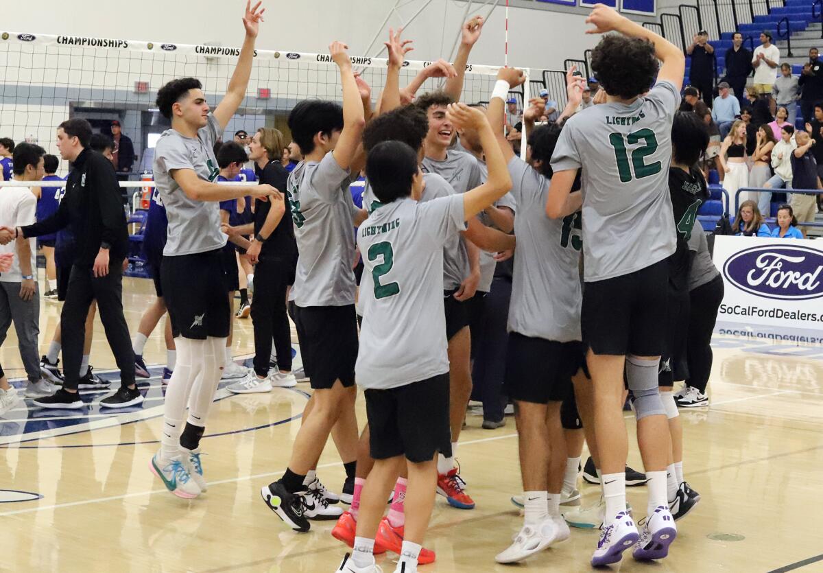 Sage Hill High School boys' volleyball team celebrate Saturday after winning their first CIF Championship.
