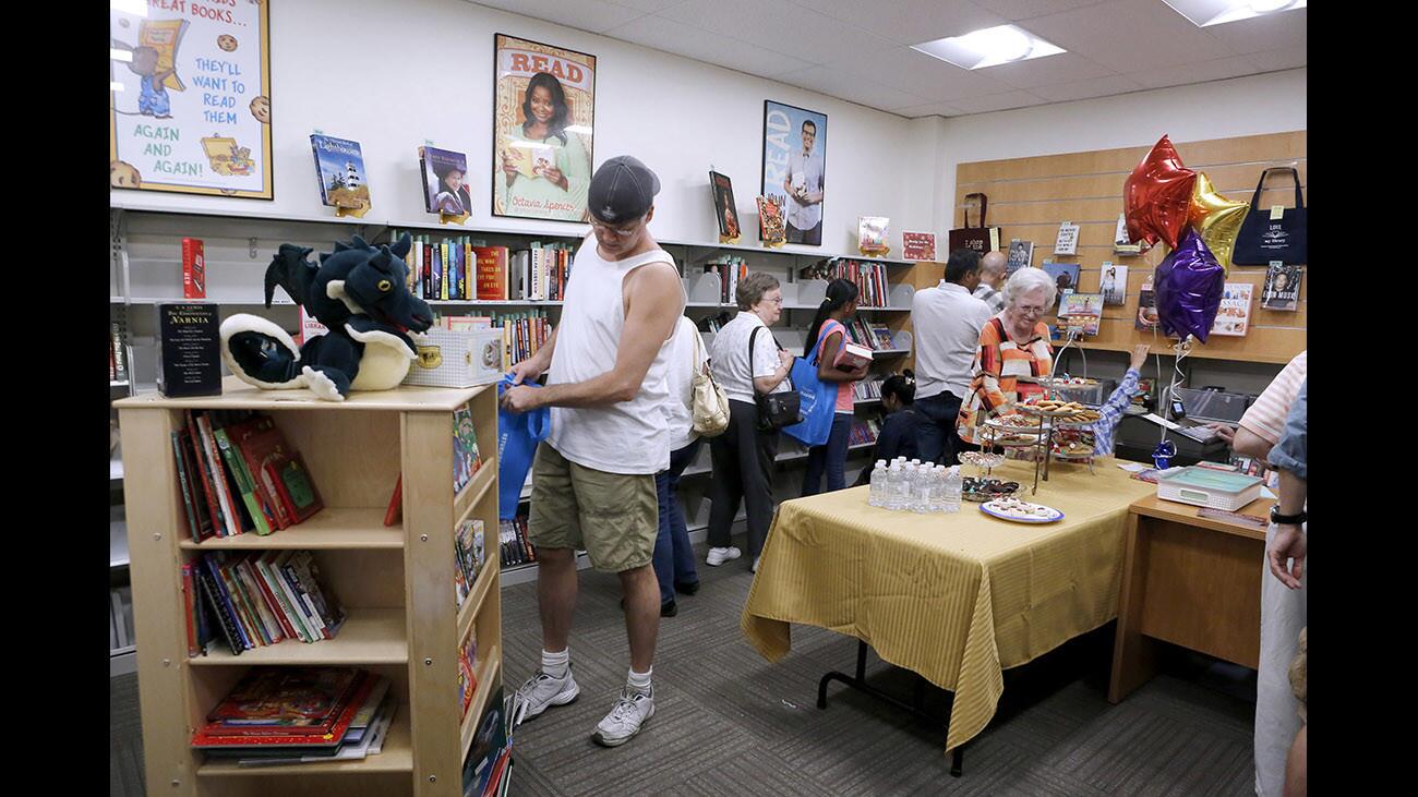 Customers flocked to the grand opening of the Burbank Central Library Friends Bookstore, in Burbank on Saturday, Dec. 2, 2017. The store is run by members of the Friends of the Burbank Public Library. The bookstore is towards the rear of the library.