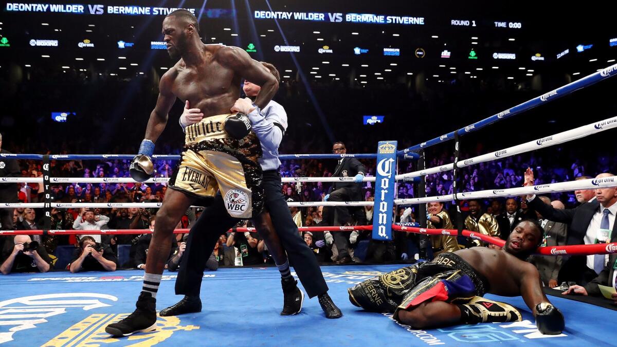 Deontay Wilder knocks out Bermane Stiverne in the first round during their rematch for Wilder's WBC heavyweight title at the Barclays Center.