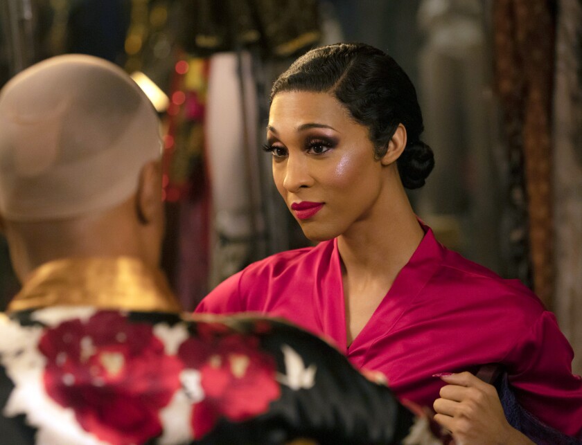 This image released by FX shows Billy Porter as Pray Tell, foreground left, and Mj Rodriguez as Blanca in a scene from "Pose." Rodriguez was nominated for an Emmy Award for outstanding leading actress in a drama series. (Eric Liebowitz/FX via AP)