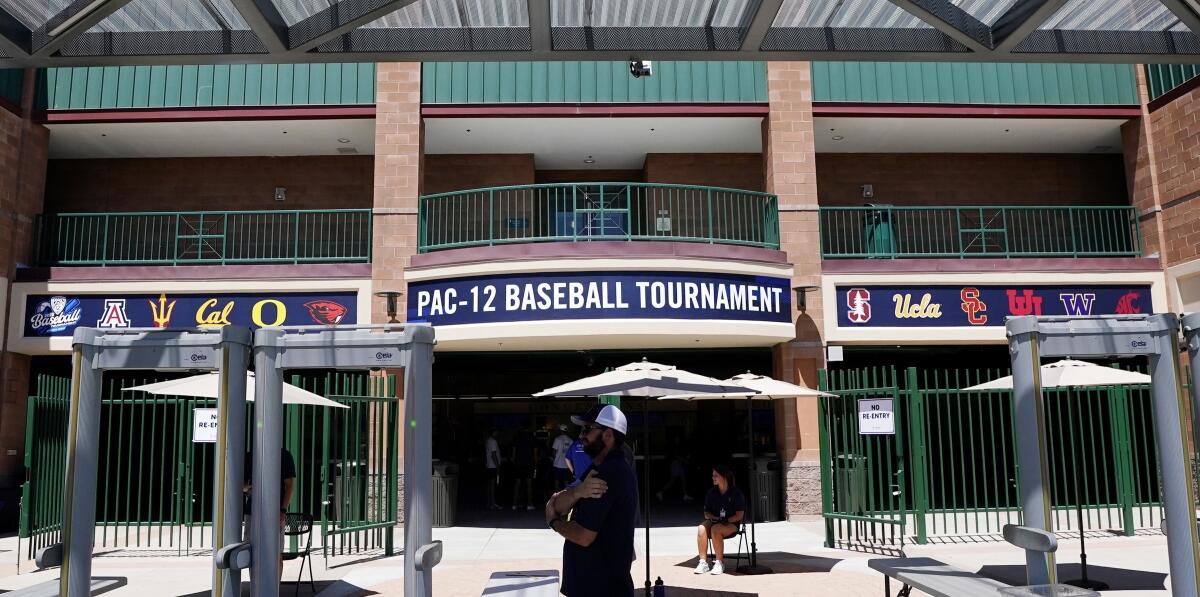 A sign for the Pac-12 baseball tournament sits above an entrance to Scottsdale Stadium.