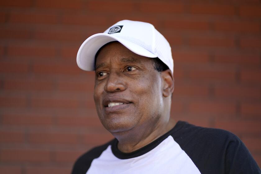 FILE - Republican presidential candidate radio show host Larry Elder speaks to fairgoers at the Iowa State Fair, Aug. 11, 2023, in Des Moines, Iowa. Elder says he is ending his 2024 Republican campaign for president. Elder said in a statement Thursday that he was endorsing former President Donald Trump. (AP Photo/Jeff Roberson, File)