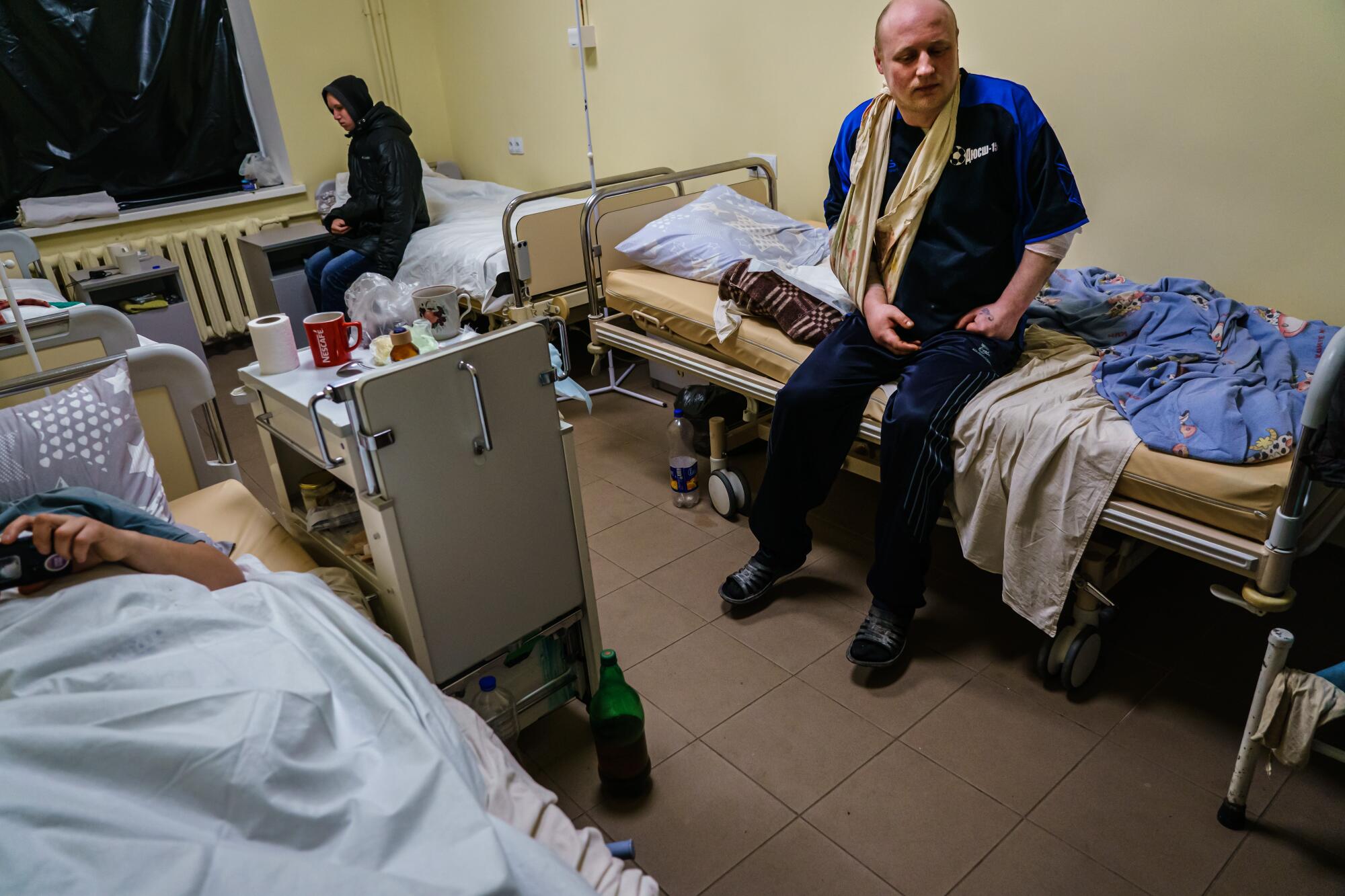 Andre Kholyavko, injured in a Russian bombardment, recovers at a hospital in Kozolets, Ukraine.