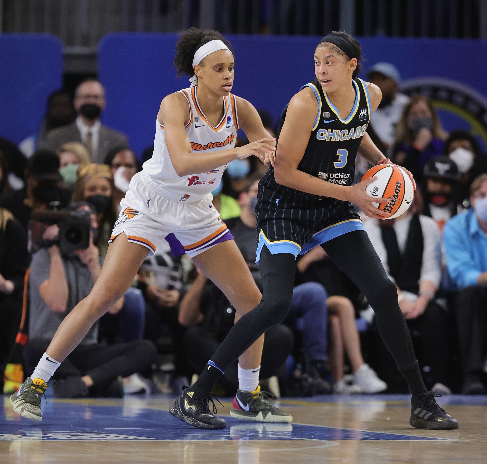 The Sky's Candace Parker makes a move under pressure from the Mercury's Brianna Turner during Game 3 of the WNBA Finals 