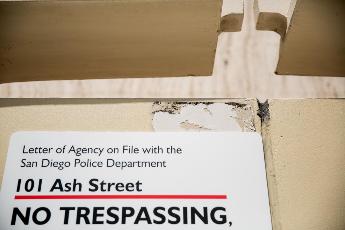 A "No trespassing" sign on a wall of the 101 Ash St. office building in downtown San Diego.