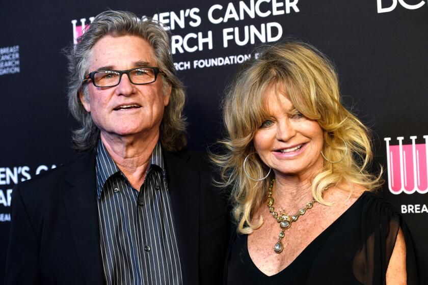 Actors Kurt Russell, left, and Goldie Hawn