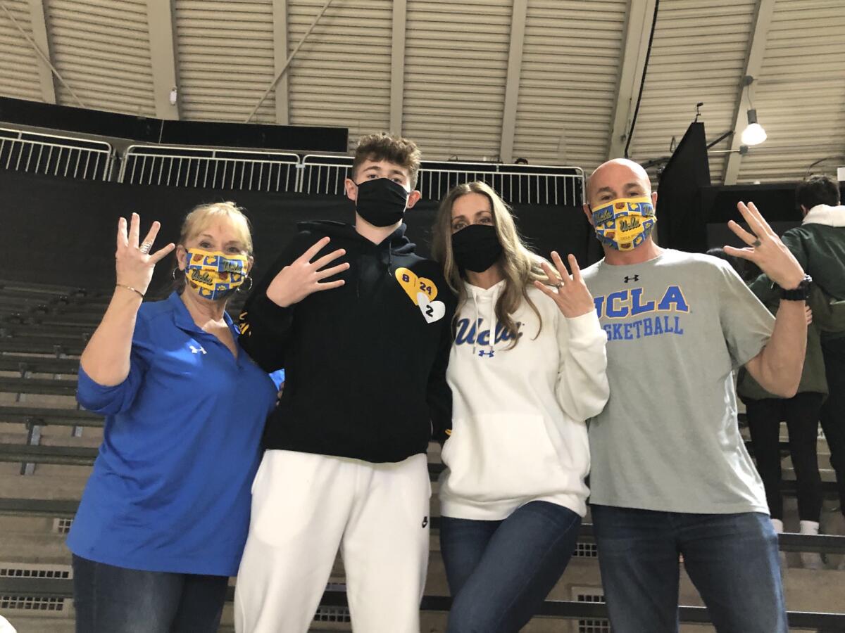 Jake Kyman's family cheers him on as UCLA men's basketball plays under COVID protocol.