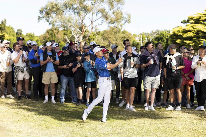 Carlos Ortiz watches a shot during the second round of LIV Series golf tournament at The Grange on Saturday, April 27, 2024 in Adelaide, Australia. (Matt Turner/LIV Golf via AP)