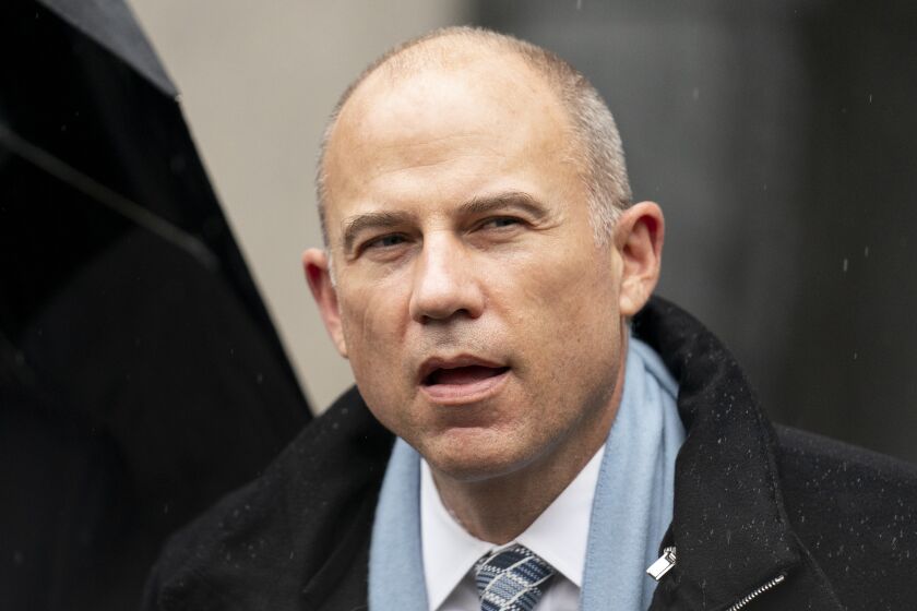 FILE - Michael Avenatti speaks to members of the media after leaving federal court on Feb. 4, 2022, in New York. Incarcerated lawyer Avenatti was sentenced in Southern California on Monday, Dec. 5, 2022, to 14 years in prison and ordered to pay $7 million in restitution after admitting he cheated four of his clients out of millions of dollars. (AP Photo/John Minchillo, File)