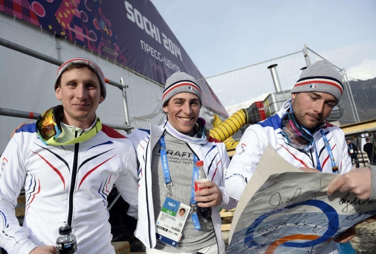 The French freestyle ski cross medalists, from left: bronze medalist Jonathan Midol, gold medal winner Jean Frederic Chapuis and silver medalist Arnaud Bovolenta.