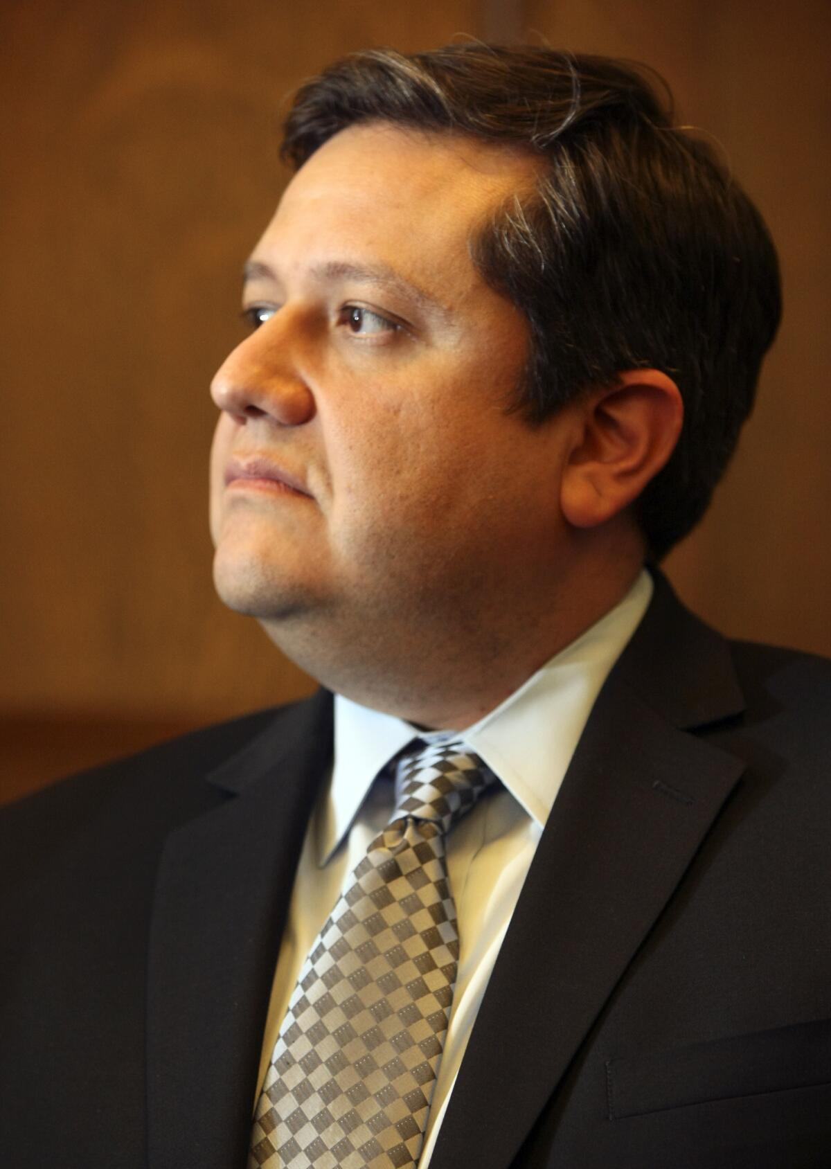 City Administrative Officer Miguel Santana, shown at L.A. City Hall in 2010, says the city should not be expanding services at this time.