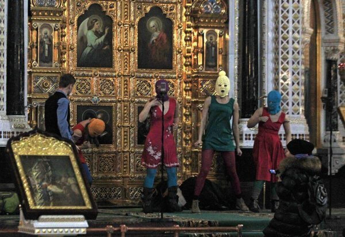 Members of the Russian punk collective Pussy Riot perform at the Christ the Savior Cathedral in Moscow.