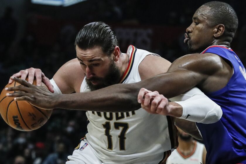 Los Angeles, CA, Monday, November 29, 2021 - Clippers center Serge Ibaka struggles to cover New Orleans Pelicans center Jonas Valanciunas (17) at Staples Center. (Robert Gauthier/Los Angeles Times)